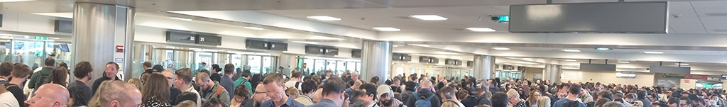 crowd standing in IAD