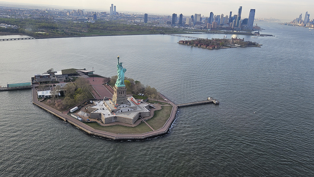 How close is Ellis island to statue of liberty